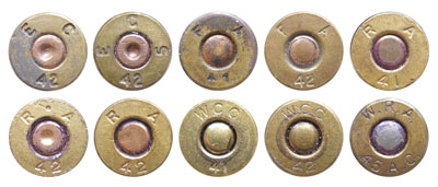  Клейма латунных гильз, выпущенных в 1941-42 гг. патронными фабриками Evansville Ordnance Plant (код EC, ECS); Frankford Arsenal (код FA); Remington Arms Co. (код RA); Winchester-Western Cartridge Company (WCC, WRA)